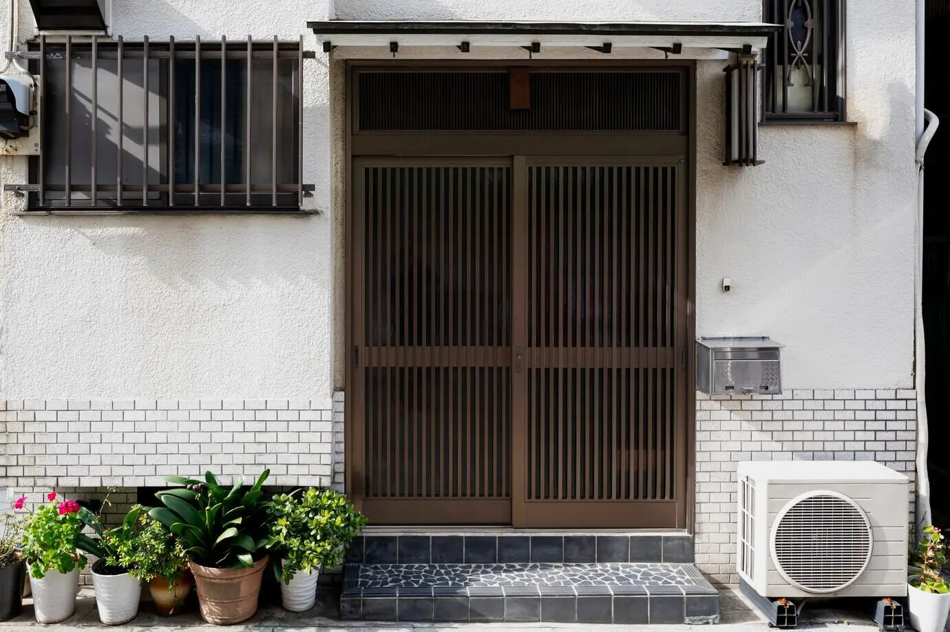 Entrance to a Japanese cultural house with bars.
