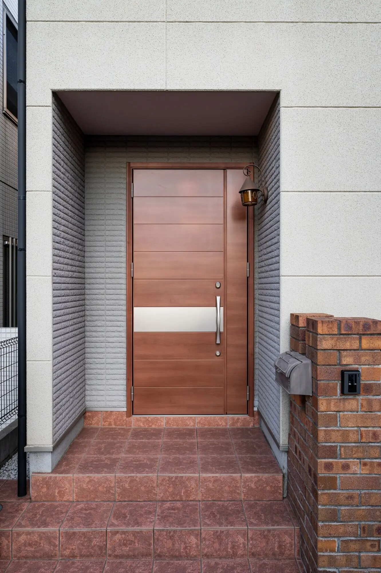 Entrance and stairs of a wooden house.